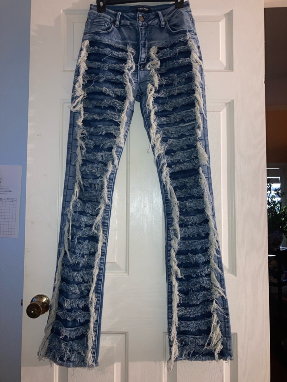 Women's Light Blue Distressed Ripped Flare Jeans